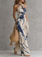 Sabrina | Jumpsuit estampado de pierna ancha con cuello halter