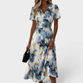 Eloísa | Vestido midi floral cruzado con detalles dorados