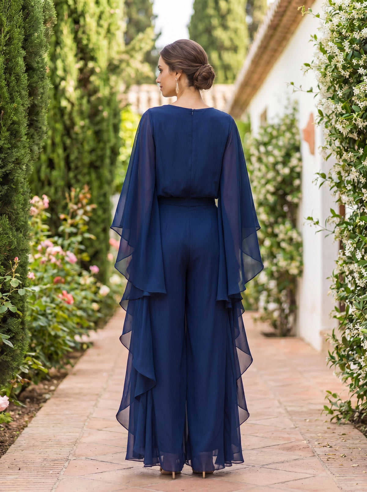 Lenita | Conjunto de blusa con mangas capa y pantalón con olanes