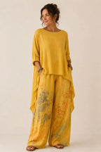 Fiorella | Conjunto floral de blusa asimétrica y pantalón de pierna ancha