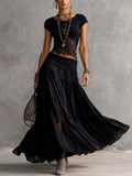Adelina | Conjunto negro de encaje con falda plisada